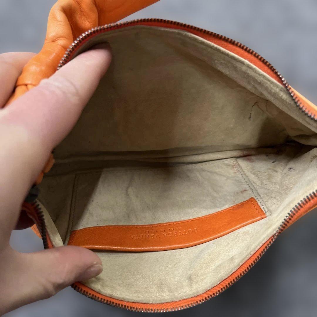 R*️様 ボッテガヴェネタ オレンジ色のレザーバッグ