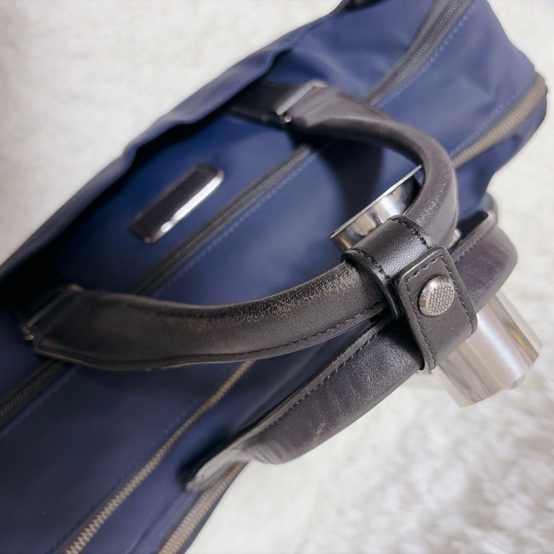 TUMIビジネスバックHarrisonサニーコンバーチブル・ブリーフ