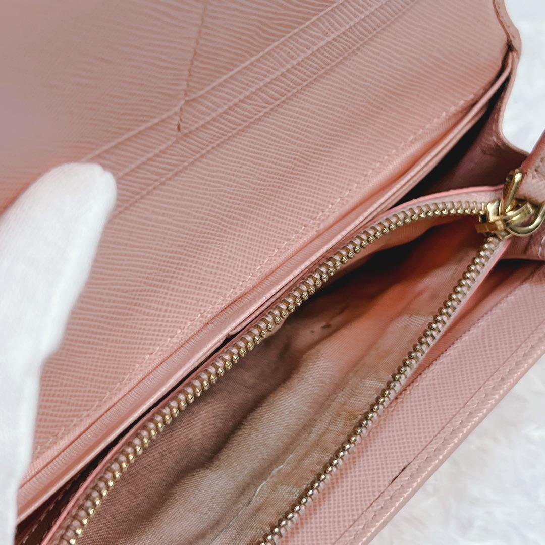 PRADA プラダ　長財布　サフィアーノ　フィオッコ　メタルロゴ　ピンク　リボン