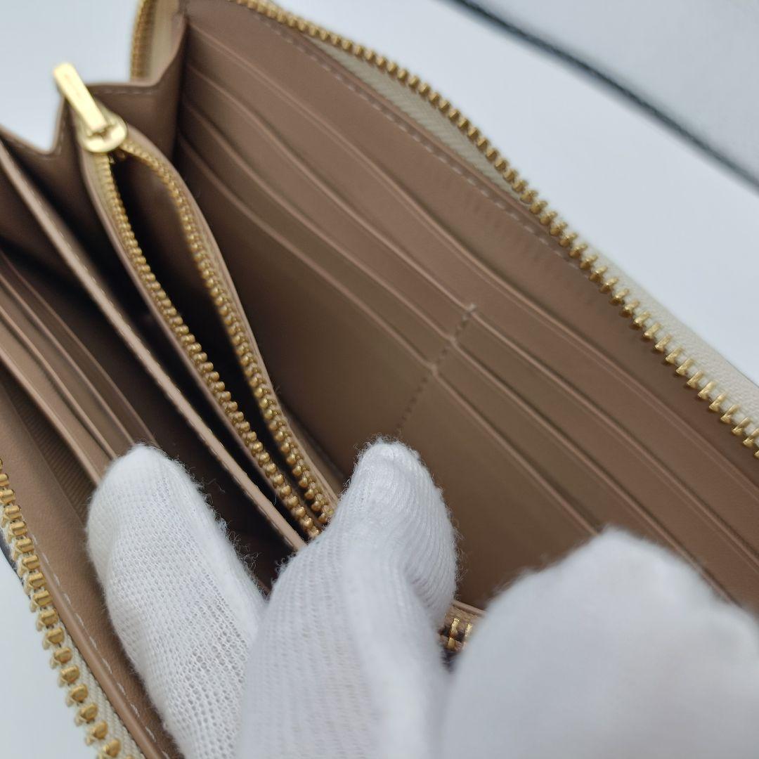 COACH コーチ C7220 シグネチャー エンボス ラウンドファスナー