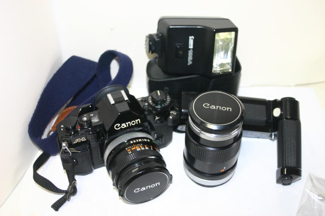 【動作確認済】キャノンA-1+純正レンズ2本+モータドライブ+ストロボ（C12）
