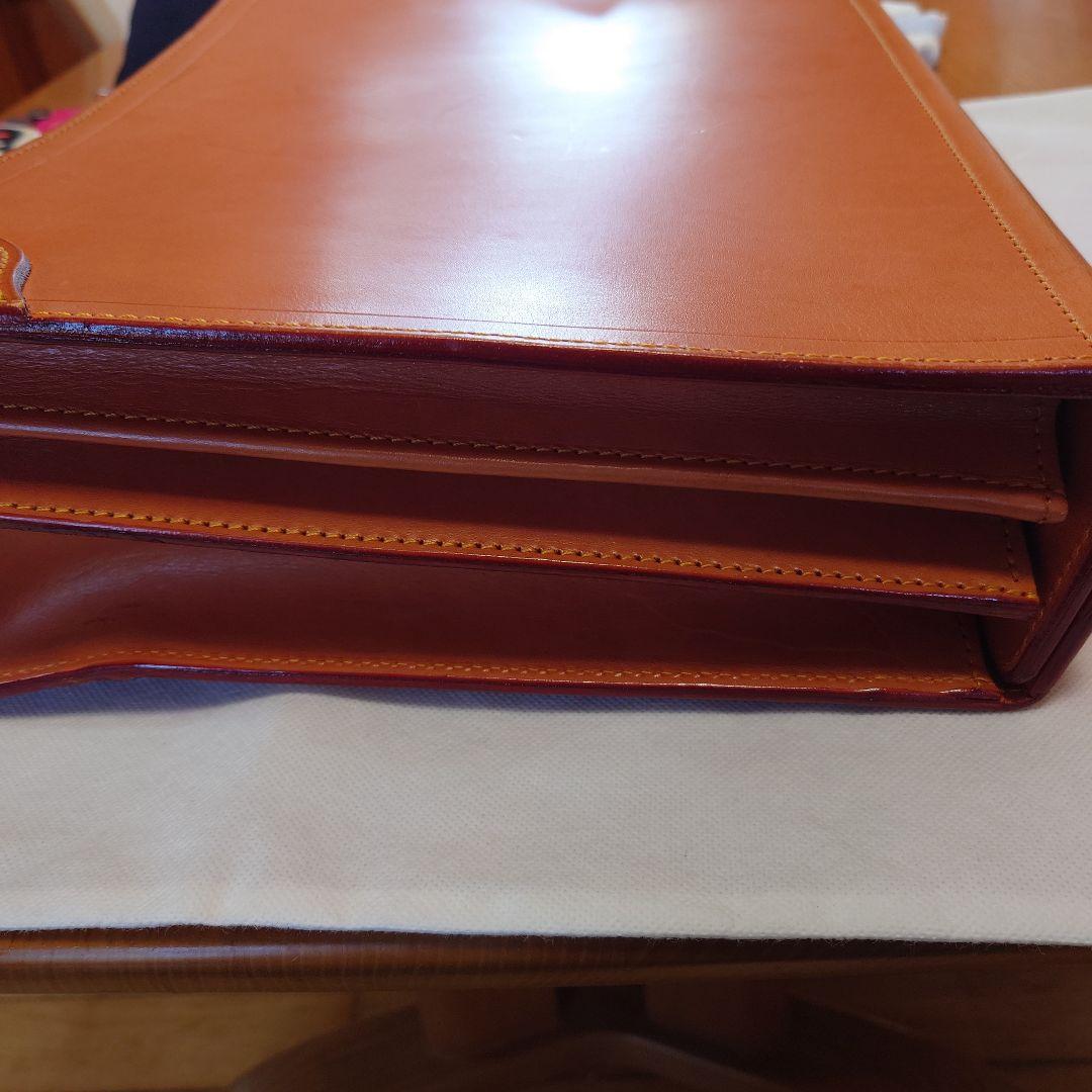 FIVEWOODSオレンジ レザービジネスバッグ（保管袋付き：PRADA）